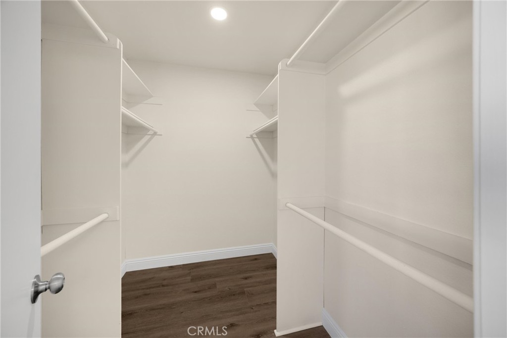 7268 Hermosa Avenue Rancho Cucamonga, CA 91701 - Photo 31 of 50 a view of walk in closet with empty racks