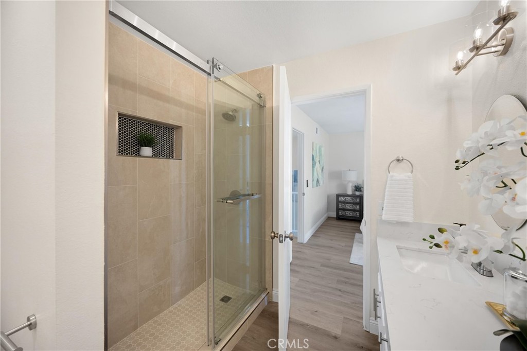 7268 Hermosa Avenue Rancho Cucamonga, CA 91701 - Photo 33 of 50 a bathroom with a bathtub and a shower