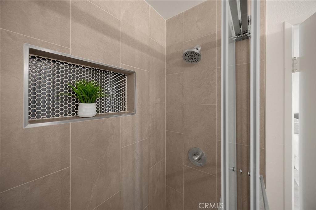 7268 Hermosa Avenue Rancho Cucamonga, CA 91701 - Photo 34 of 50 a bathroom with a shower