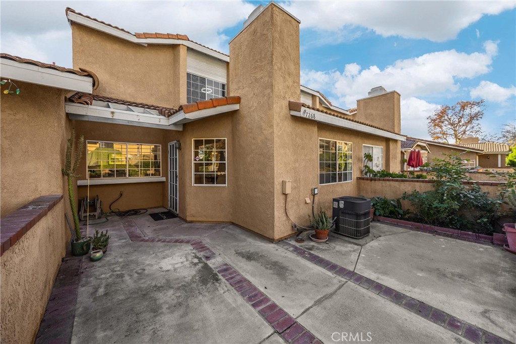 7268 Hermosa Avenue Rancho Cucamonga, CA 91701 - Photo 5 of 50 front view of a house with a yard