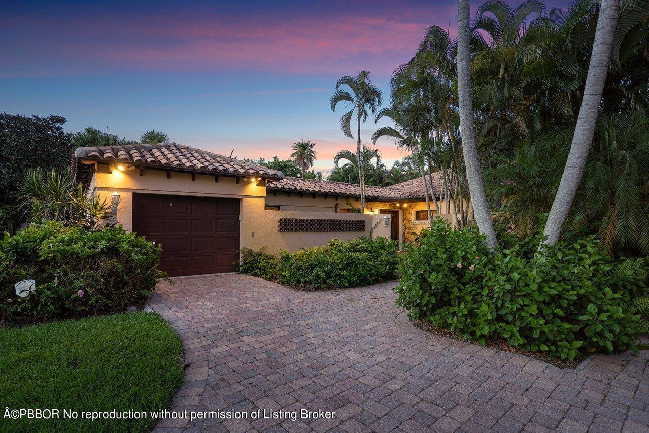 2 Little Pond Road, Unit 1 Lantana, FL 33462 - Photo 22 of 26 a front view of a house with garden