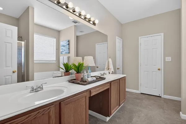 a white bath tub sitting next to a window