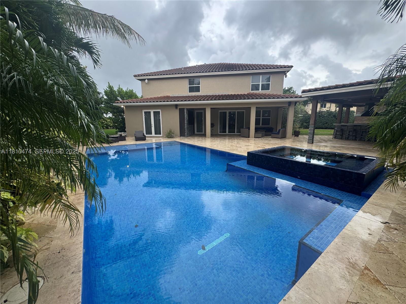 2230 Northwest 17th Avenue Homestead, FL 33030 - Photo 20 of 31 a view of house with yard outdoor seating and barbeque oven