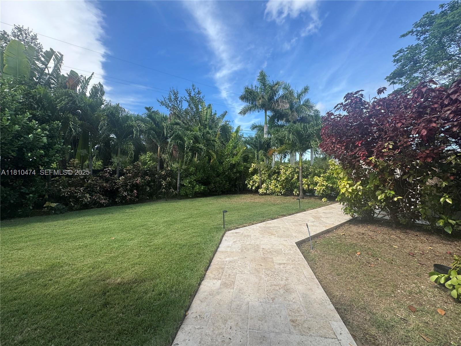 2230 Northwest 17th Avenue Homestead, FL 33030 - Photo 8 of 31 a view of a yard with an trees