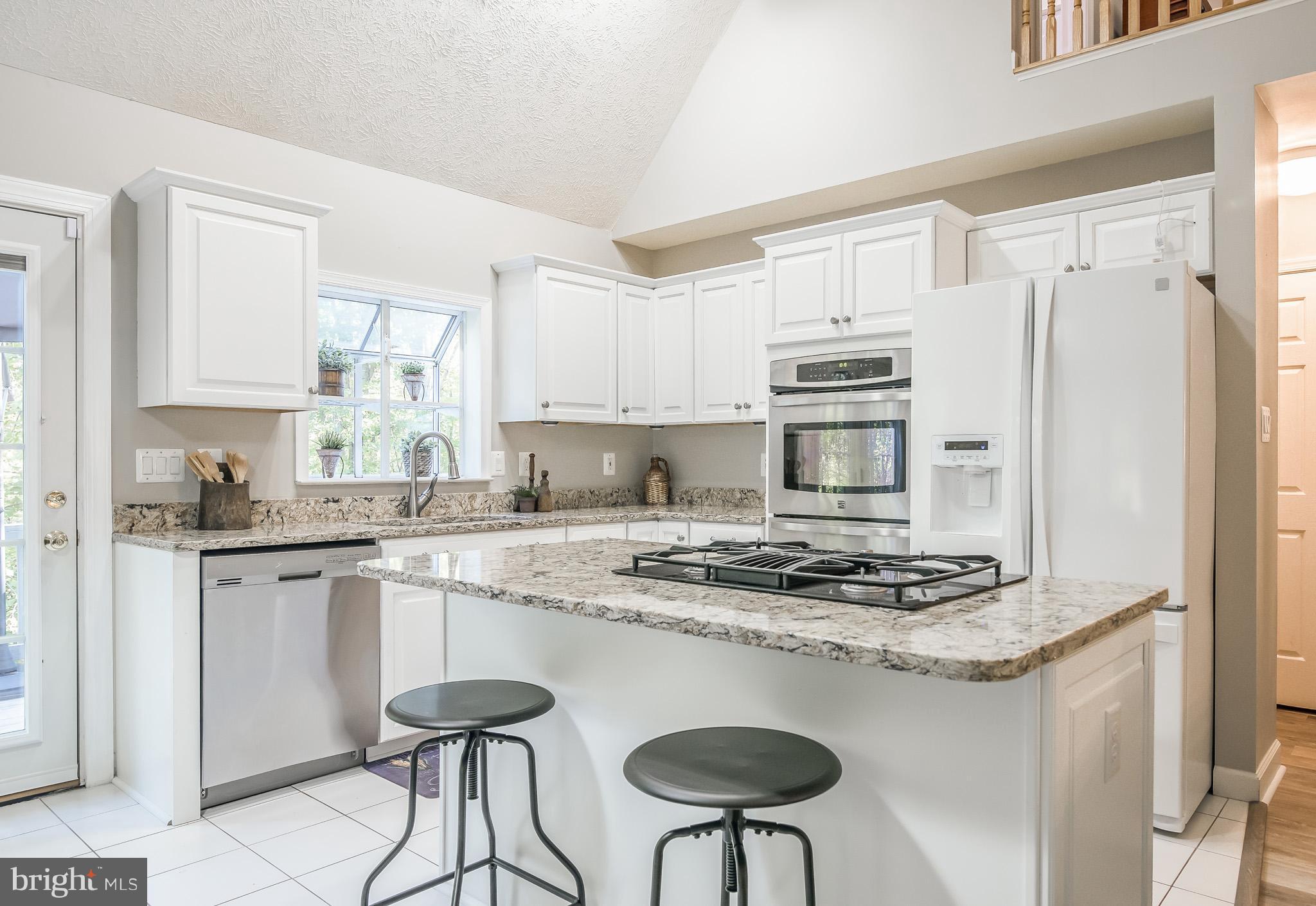 3 Ridgeview Circle Fredericksburg, VA 22406 - Photo 12 of 30 a kitchen with stainless steel appliances granite countertop a stove refrigerator sink and cabinets