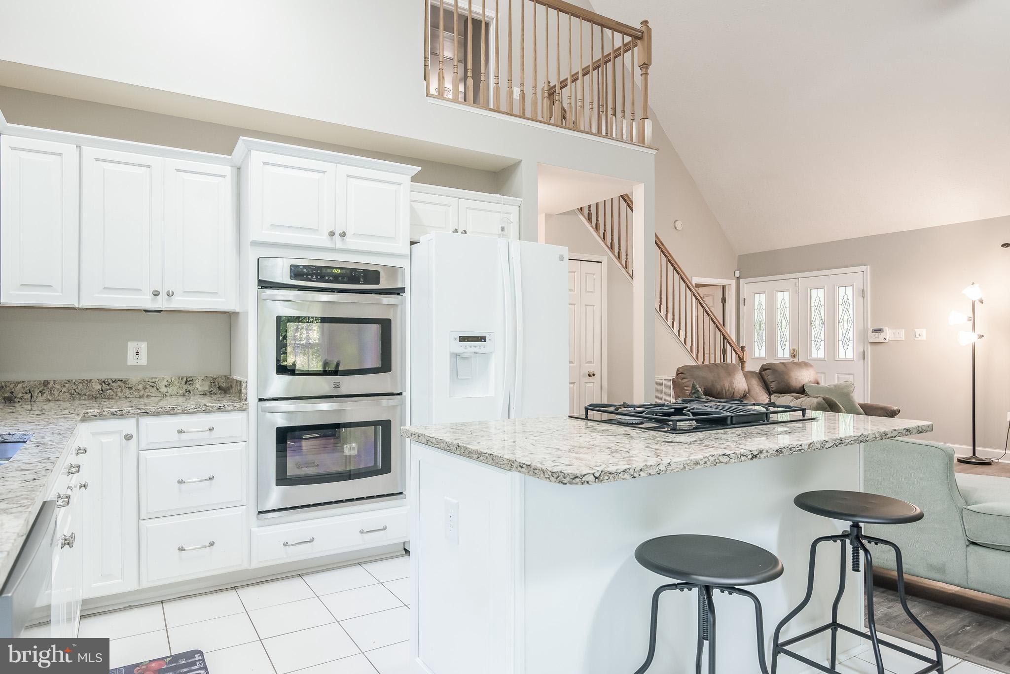3 Ridgeview Circle Fredericksburg, VA 22406 - Photo 13 of 30 a kitchen with stainless steel appliances granite countertop a stove a sink and a refrigerator