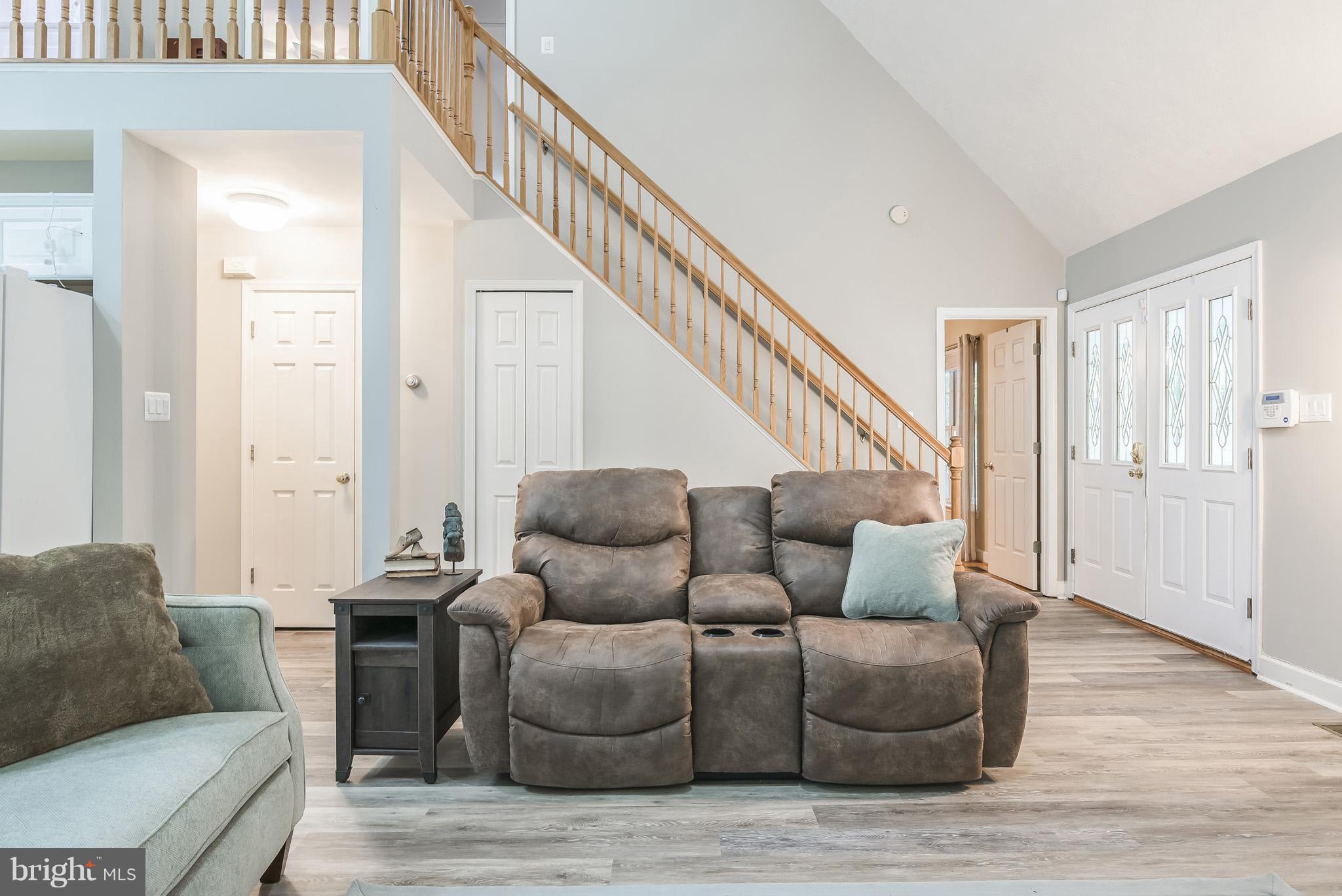 3 Ridgeview Circle Fredericksburg, VA 22406 - Photo 8 of 30 a living room with furniture and a stairs