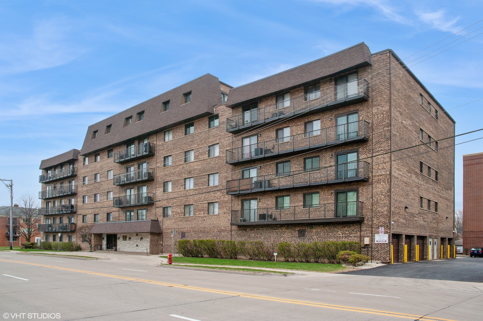 a tall building sitting on the side of a street
