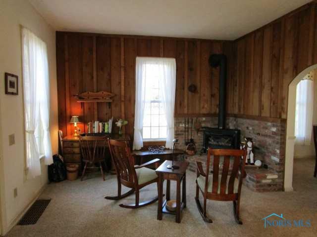 9157 South River Road Waterville, OH 43566 - Photo 3 of 11 Living Room. Living Room with Wood Stove