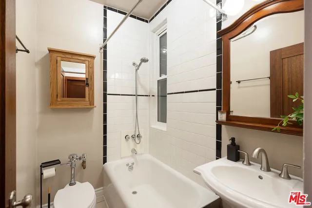 a bathroom with a sink and a bathtub
