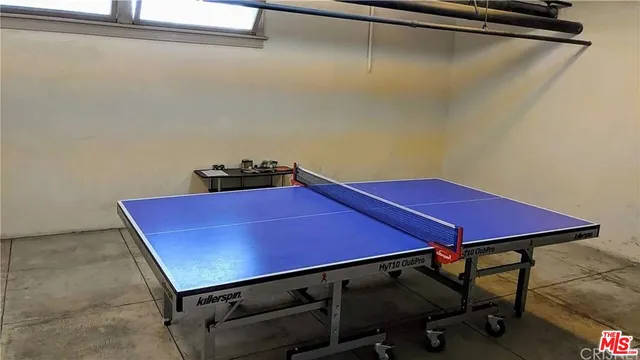 a view of a room with table tennis table