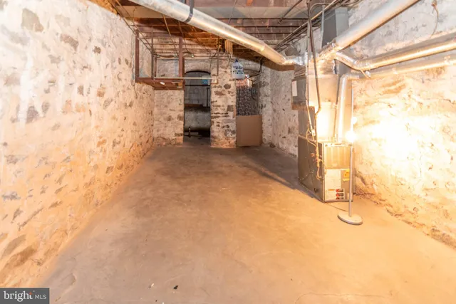 a view of entry way with wooden wall