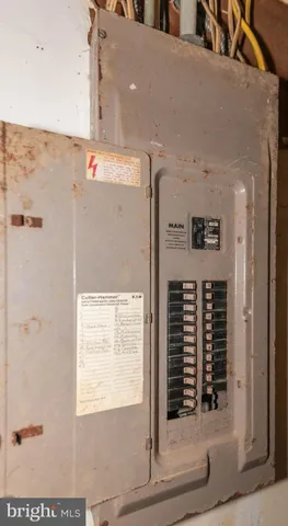 a view of a balcony with a floor to ceiling window and wooden fence