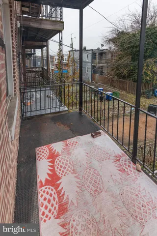 a front view of a house with barbeque area