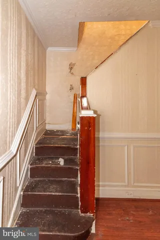 a view of entryway with wooden floor