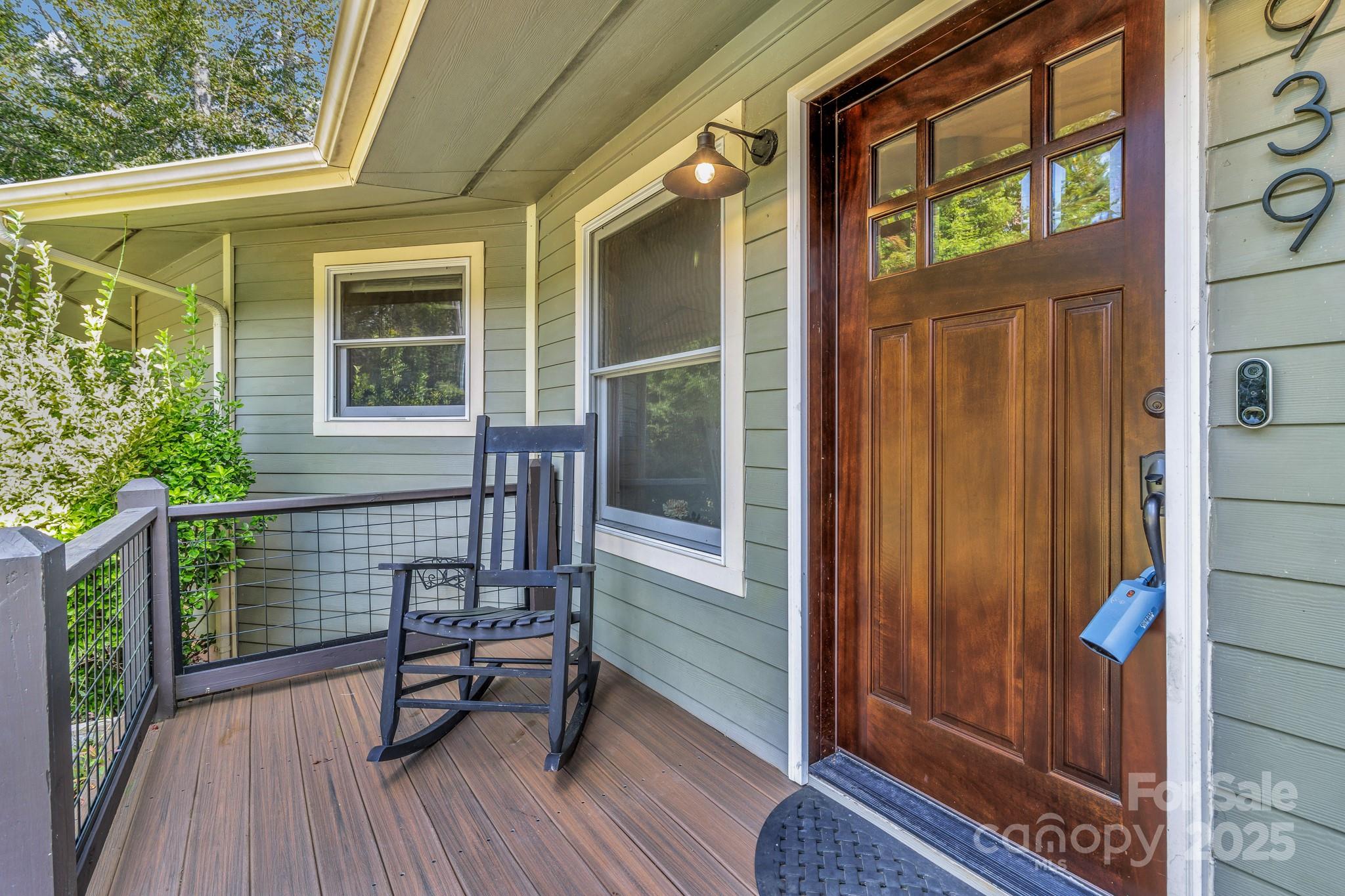 939 Morgan Hill Road Black Mountain, NC 28711 - Photo 2 of 48 a view of chair in the balcony