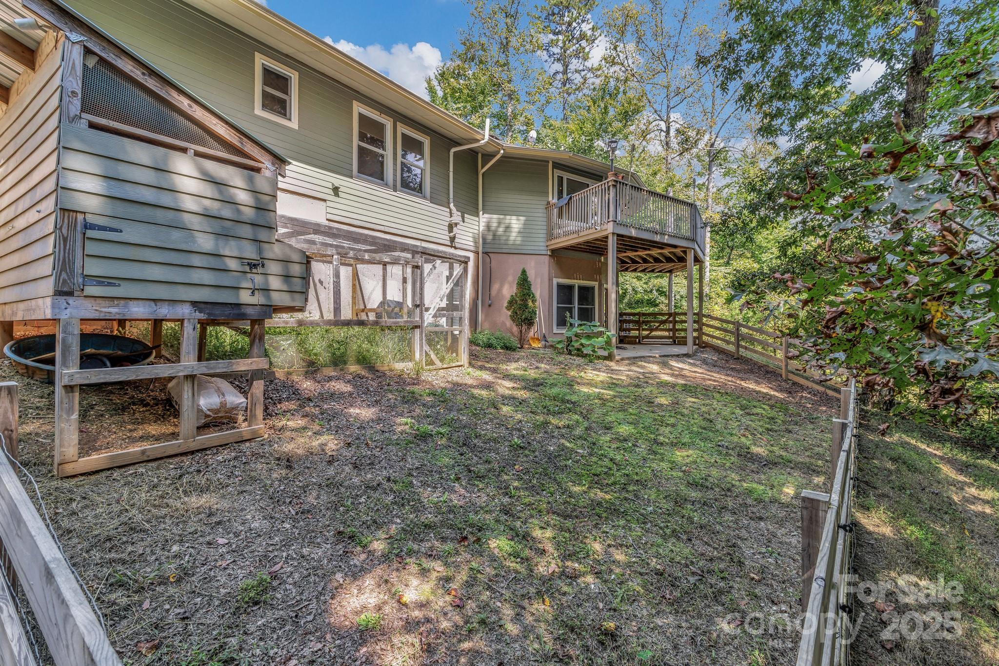 939 Morgan Hill Road Black Mountain, NC 28711 - Photo 21 of 48 a view of a house with a yard