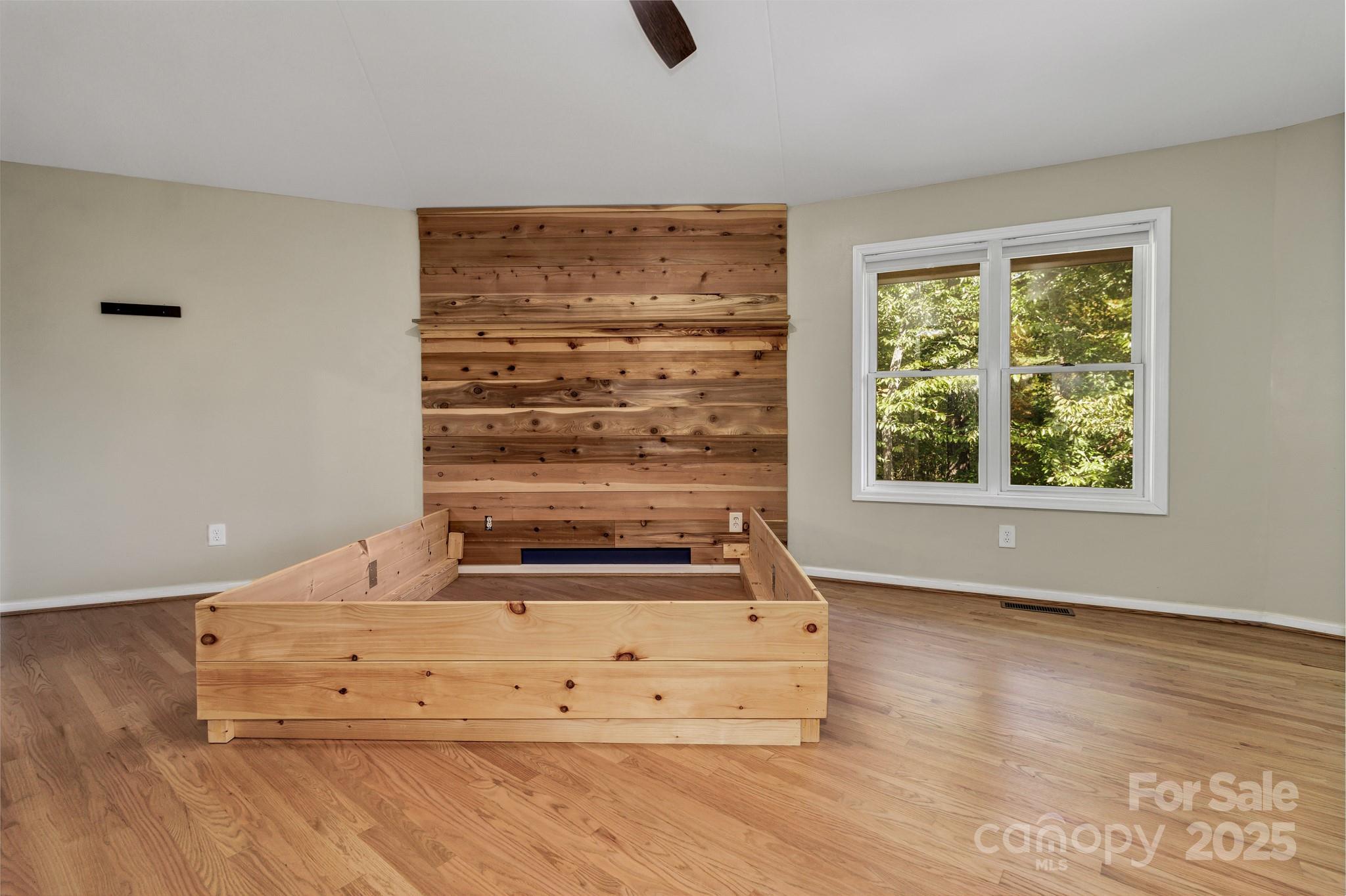 939 Morgan Hill Road Black Mountain, NC 28711 - Photo 33 of 48 a view of kitchen with wooden floor and window