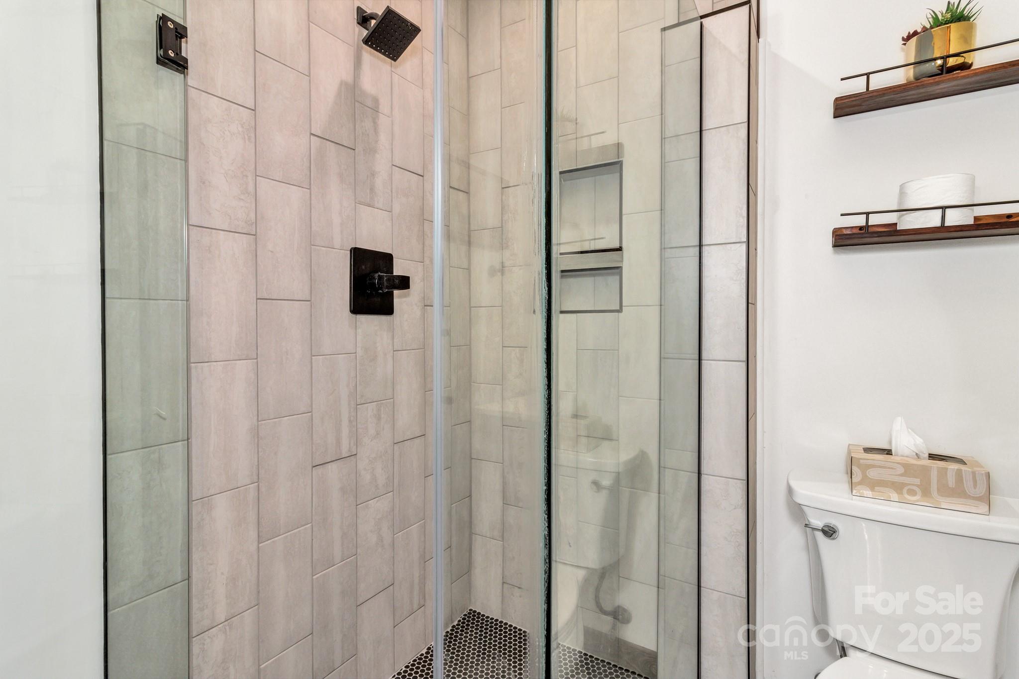 939 Morgan Hill Road Black Mountain, NC 28711 - Photo 39 of 48 a bathroom with a shower