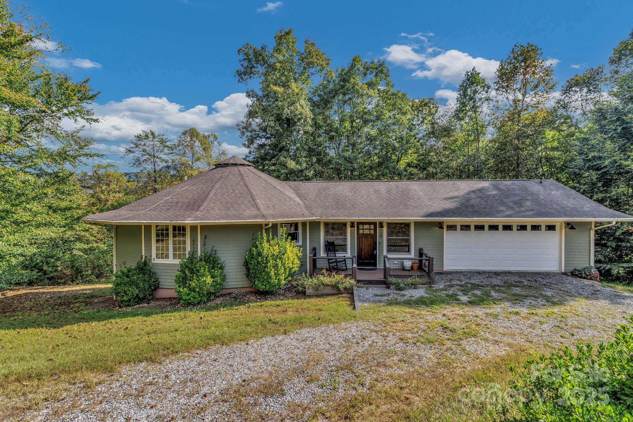 939 Morgan Hill Road Black Mountain, NC 28711 - Photo 5 of 48 front view of a house with a yard