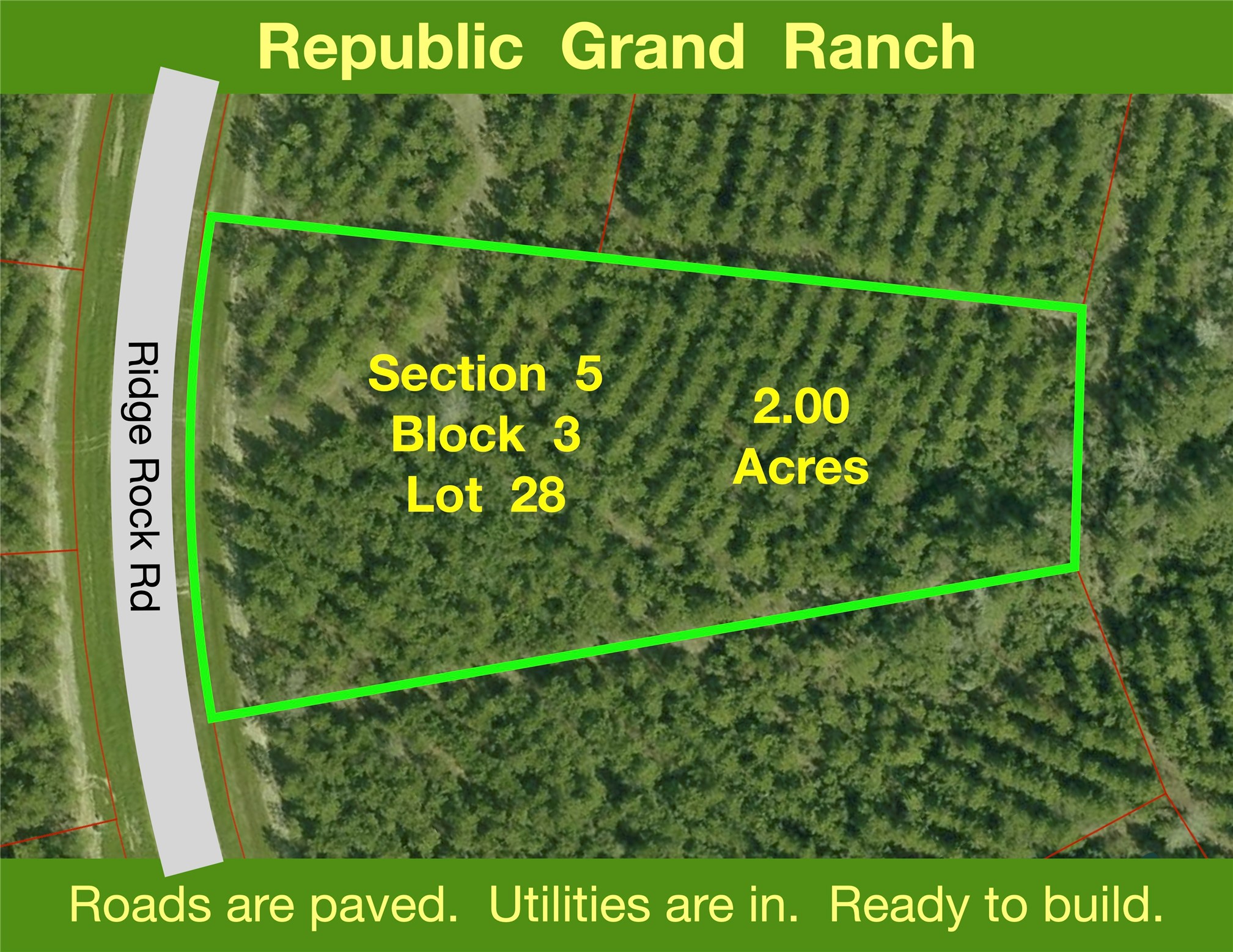 15702 Ridge Rock Road Willis, TX 77378 - Photo 1 of 19 a sign on the side of the road