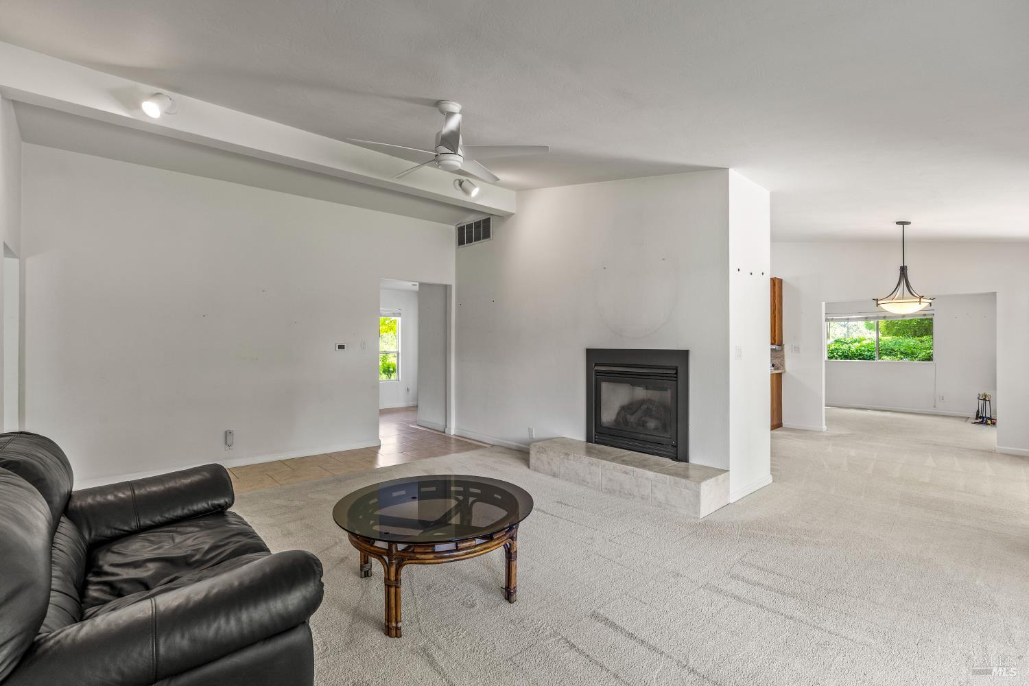 625-629 Hill Road Angwin, CA 94508 - Photo 9 of 64 a living room with furniture and a fireplace