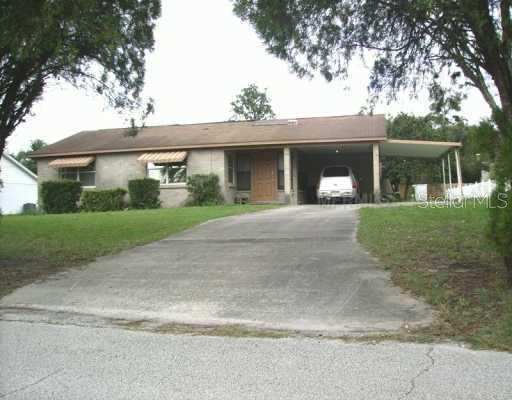276 East Constance Road DeBary, FL 32713 - Photo 1 of 1 front view of a house with a yard