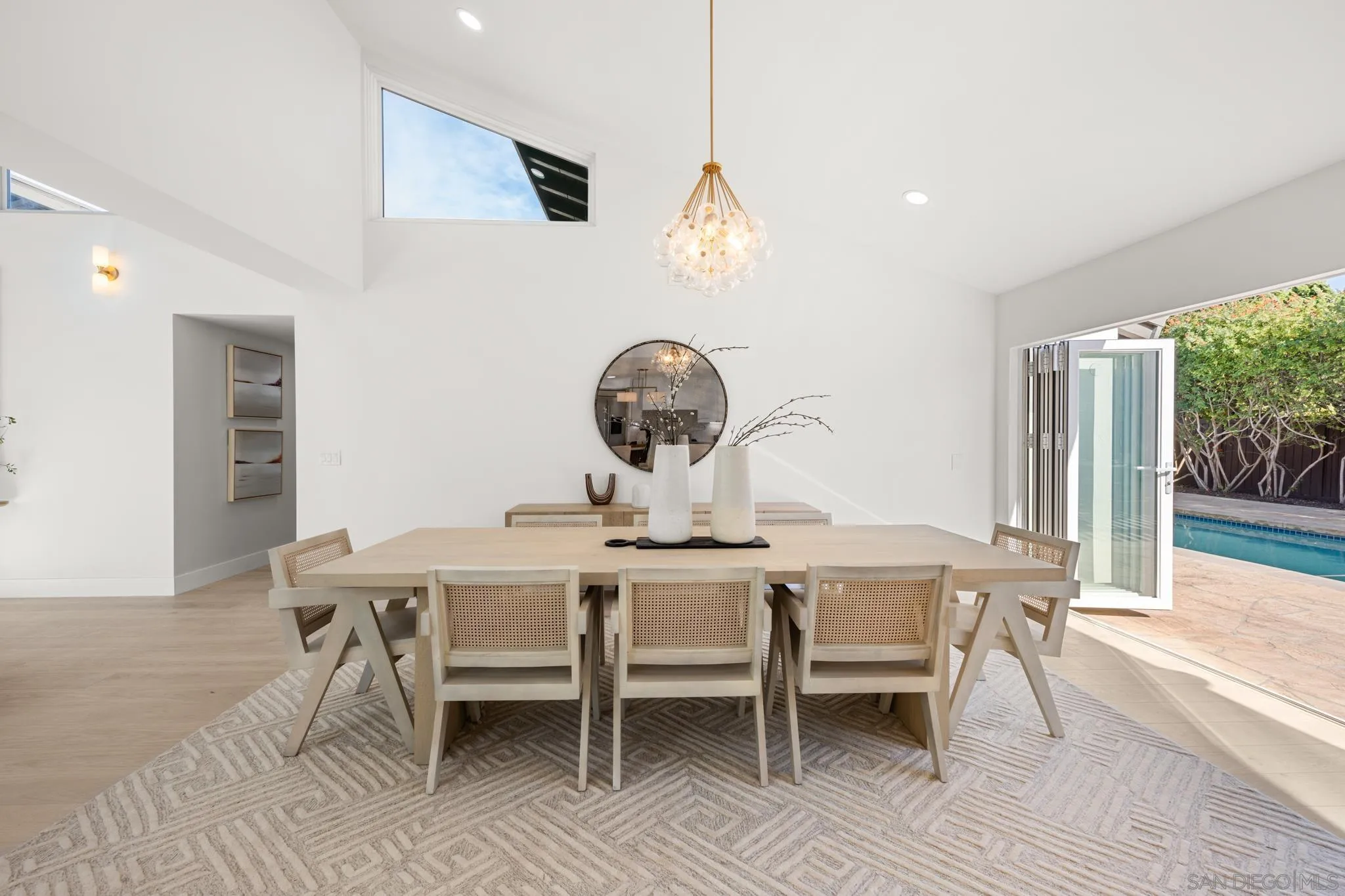3867 Via Reposo Rancho Santa Fe, CA 92091 - Photo 28 of 33 a view of a dining room with furniture and wooden floor