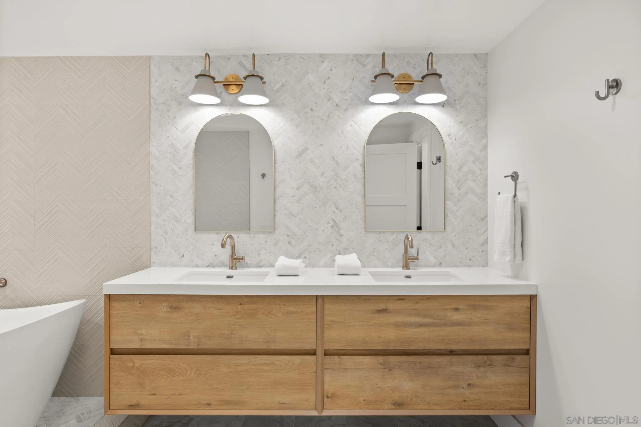 3867 Via Reposo Rancho Santa Fe, CA 92091 - Photo 8 of 33 a bathroom with a sink and a mirror