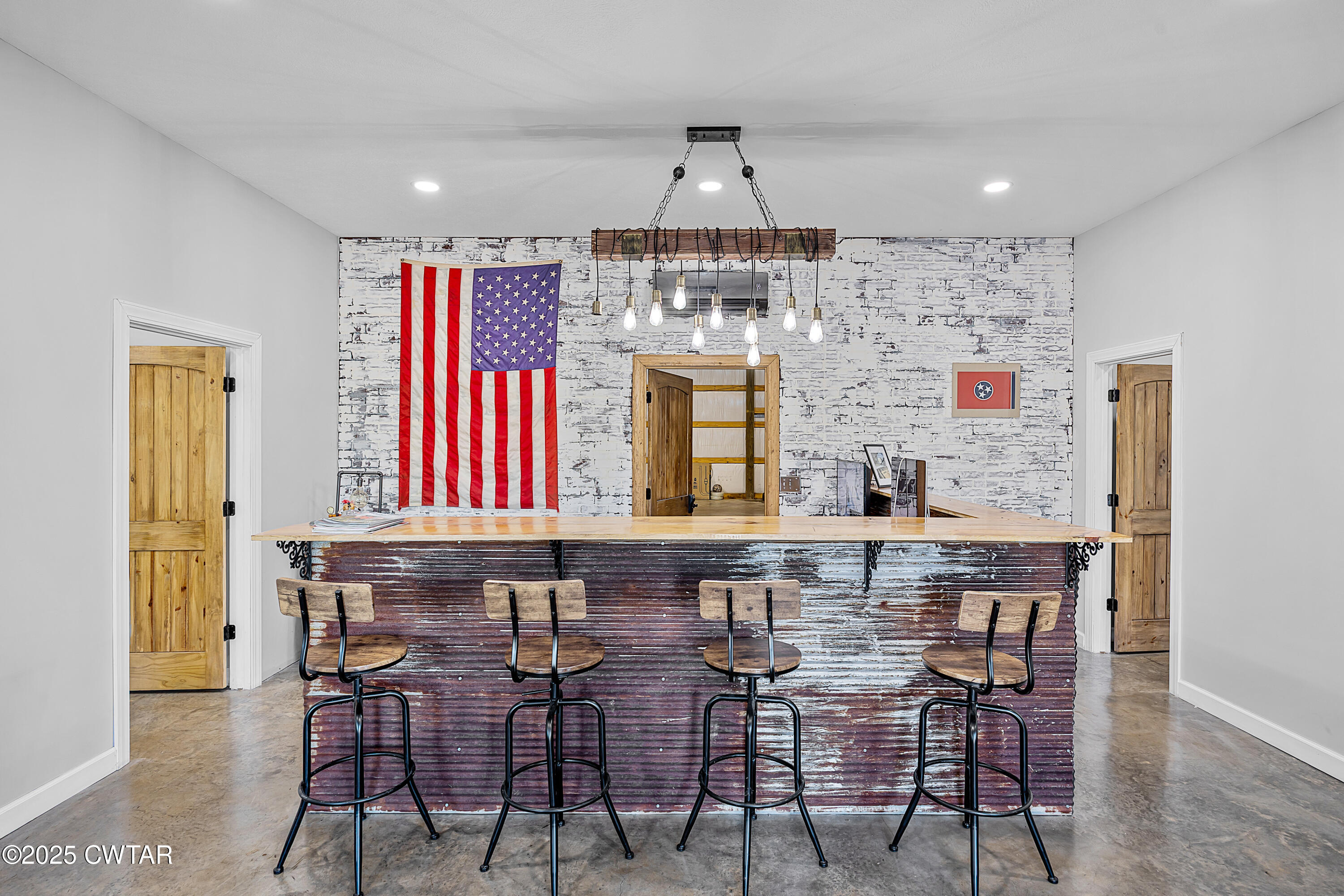90 Dawson Bottom Road Humboldt, TN 38343 - Photo 5 of 24 a kitchen with a table and chairs in it