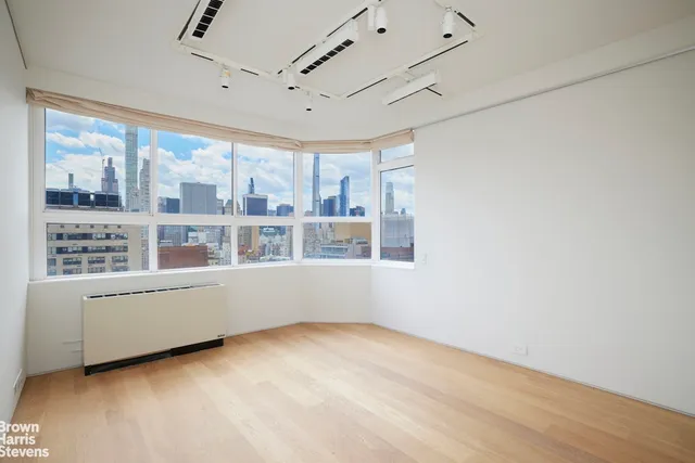 a bathroom with a toilet a sink and bathtub