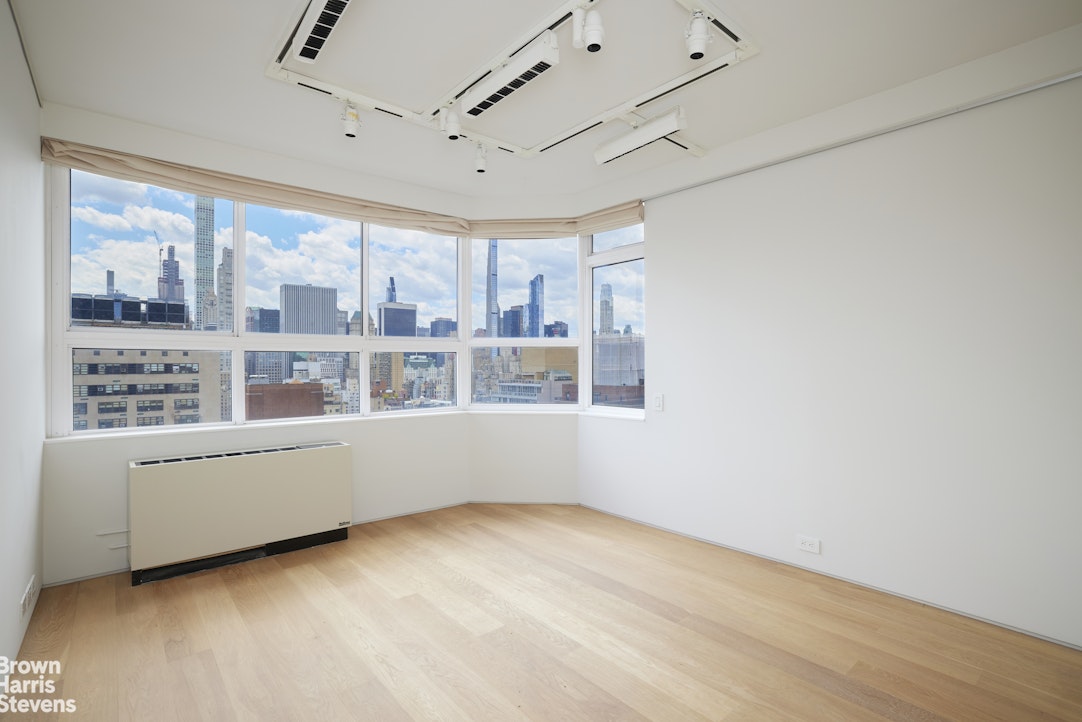 110 East 71st Street, Unit 19 Manhattan, NY 10021 - Photo 9 of 15 a view of an empty room with a window