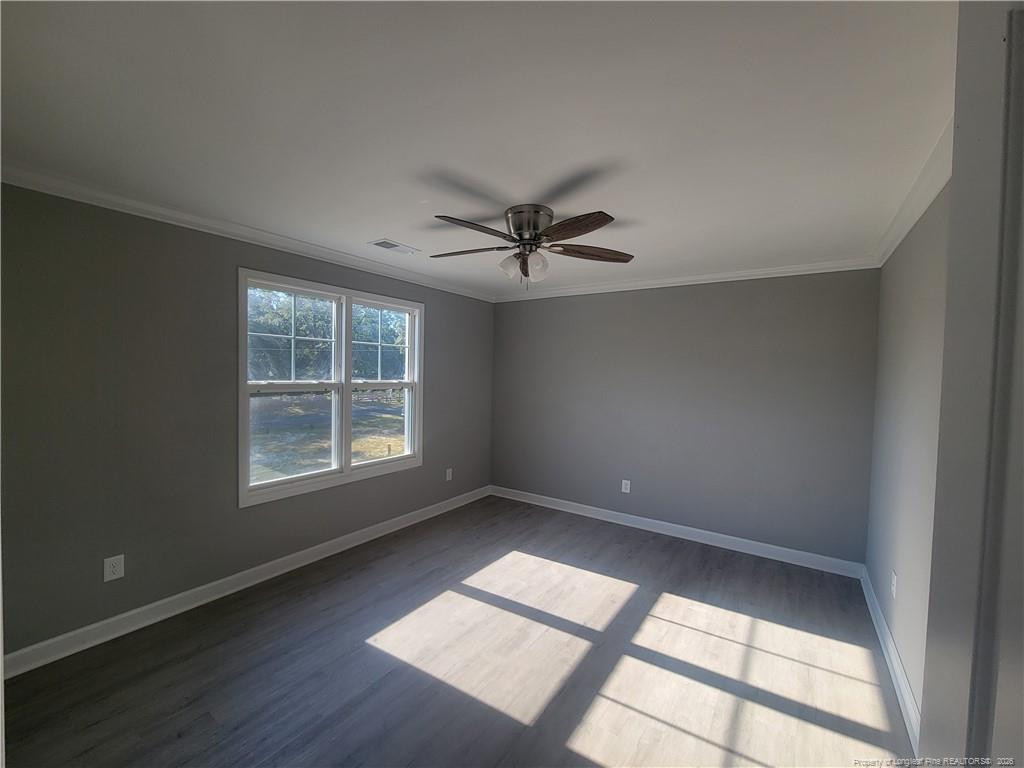 2960 H H Clark Road Fayetteville, NC 28306 - Photo 21 of 33 an empty room with a window