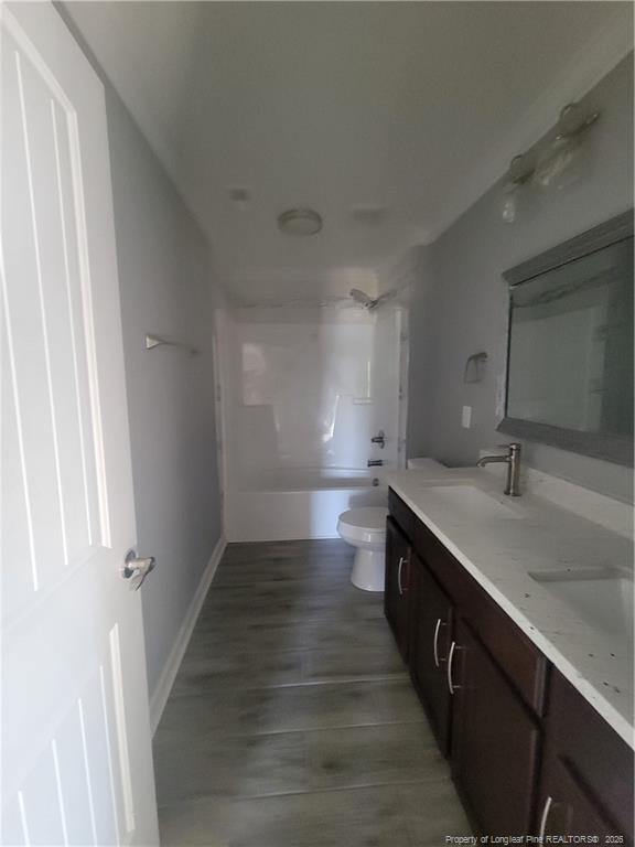 2960 H H Clark Road Fayetteville, NC 28306 - Photo 22 of 33 a view of a bathroom with sink and mirror
