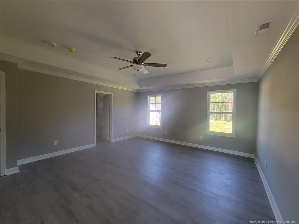 2960 H H Clark Road Fayetteville, NC 28306 - Photo 24 of 33 a view of an empty room with a window and wooden floor