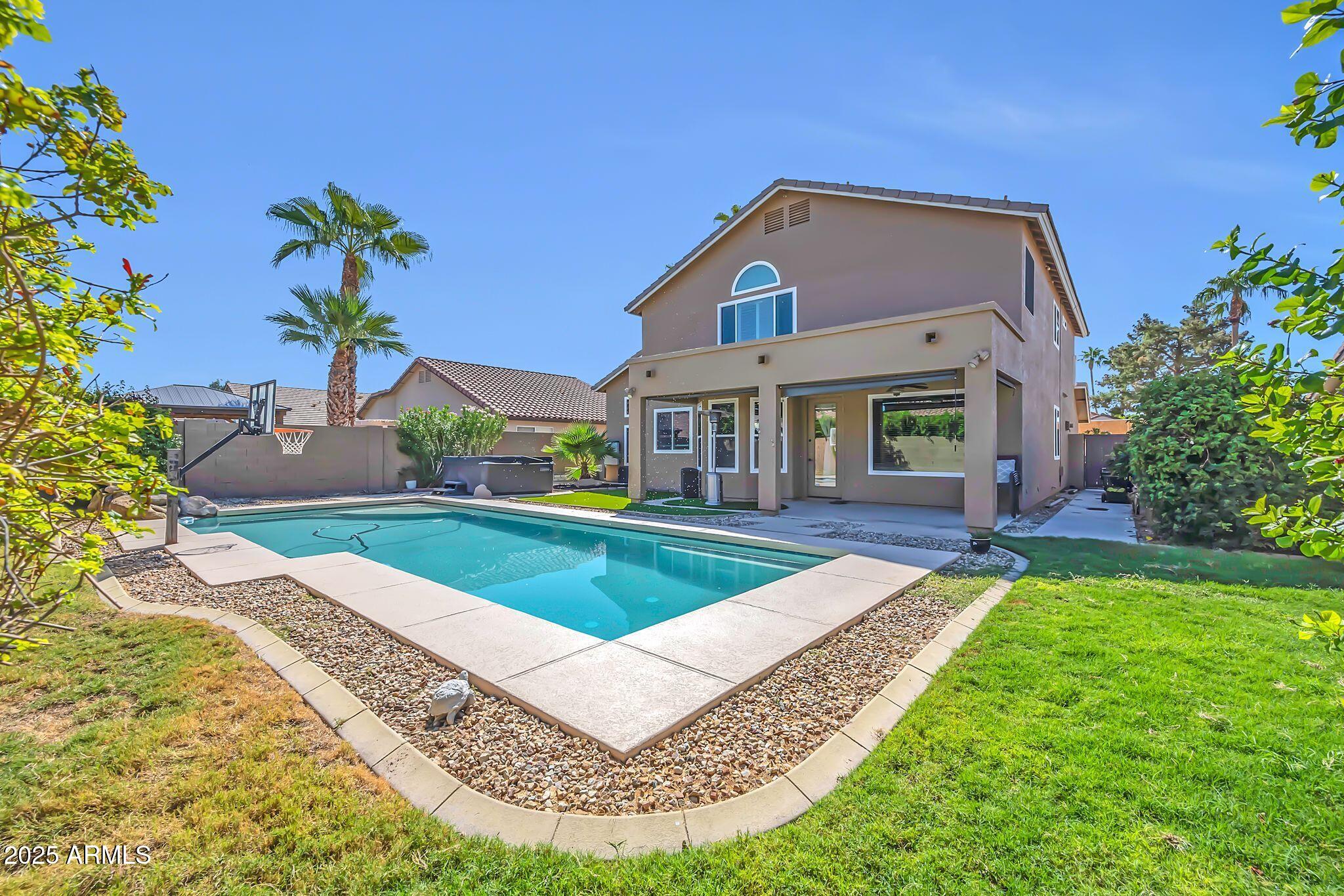 1302 West Winchester Way Chandler, AZ 85224 - Photo 41 of 61 a front view of a house with a yard