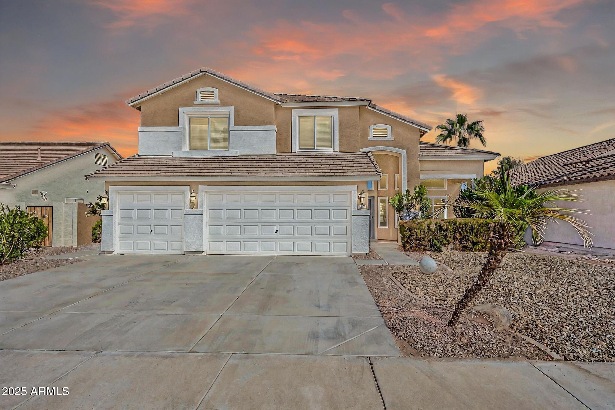 1302 West Winchester Way Chandler, AZ 85224 - Photo 44 of 61 front view of a house with a yard