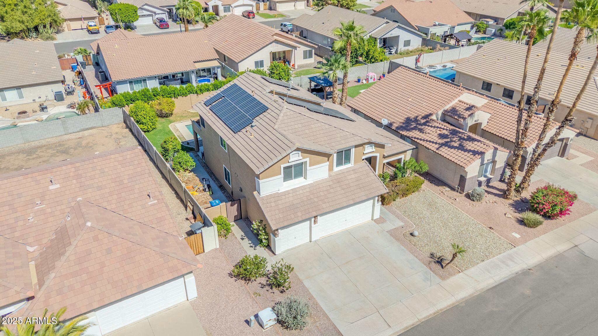 1302 West Winchester Way Chandler, AZ 85224 - Photo 51 of 61 an aerial view of a house with outdoor space