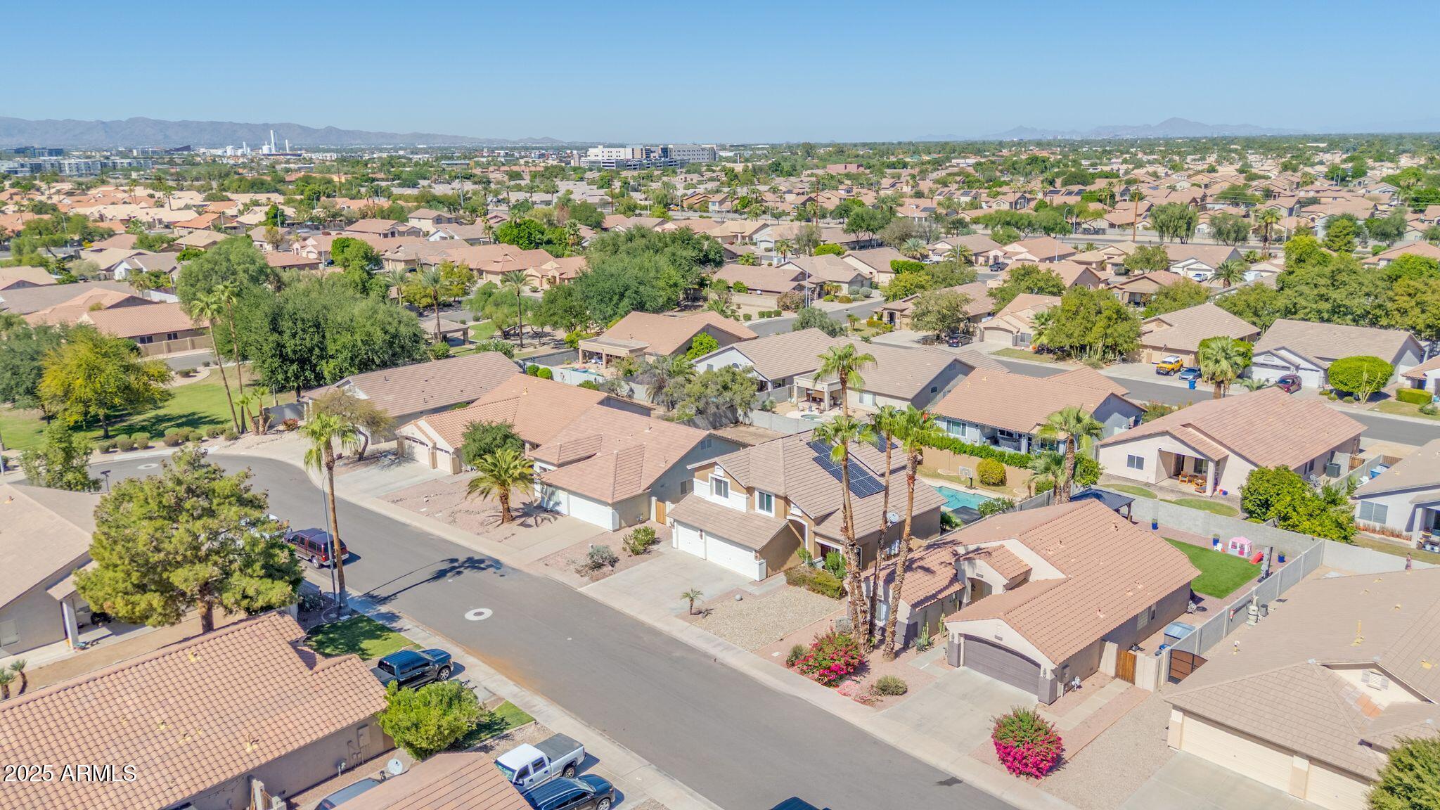 1302 West Winchester Way Chandler, AZ 85224 - Photo 56 of 61 an aerial view of a city with lots of residential buildings