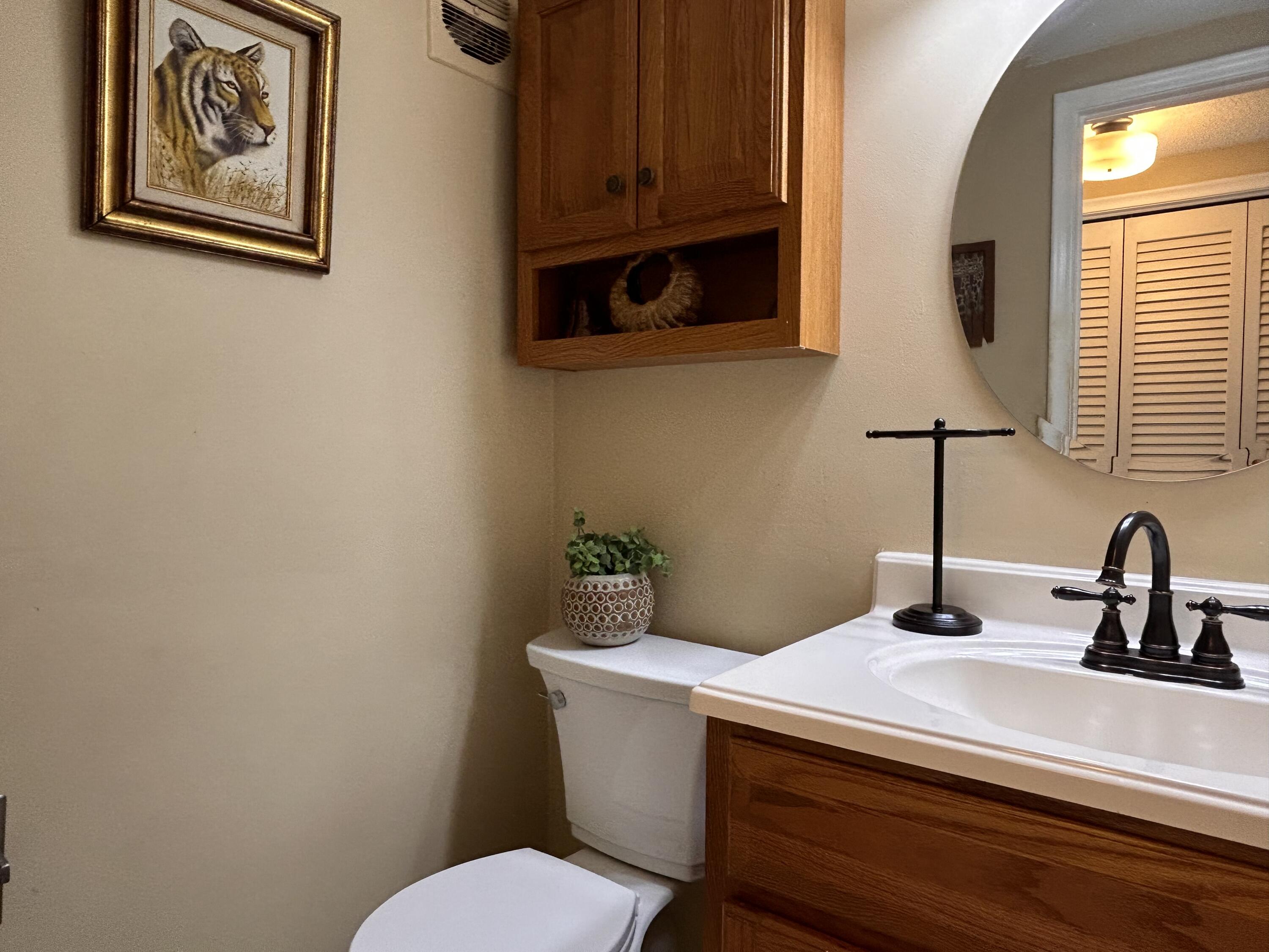 680 Horizon West, Unit 103 Boynton Beach, FL 33435 - Photo 12 of 61 a bathroom with a toilet