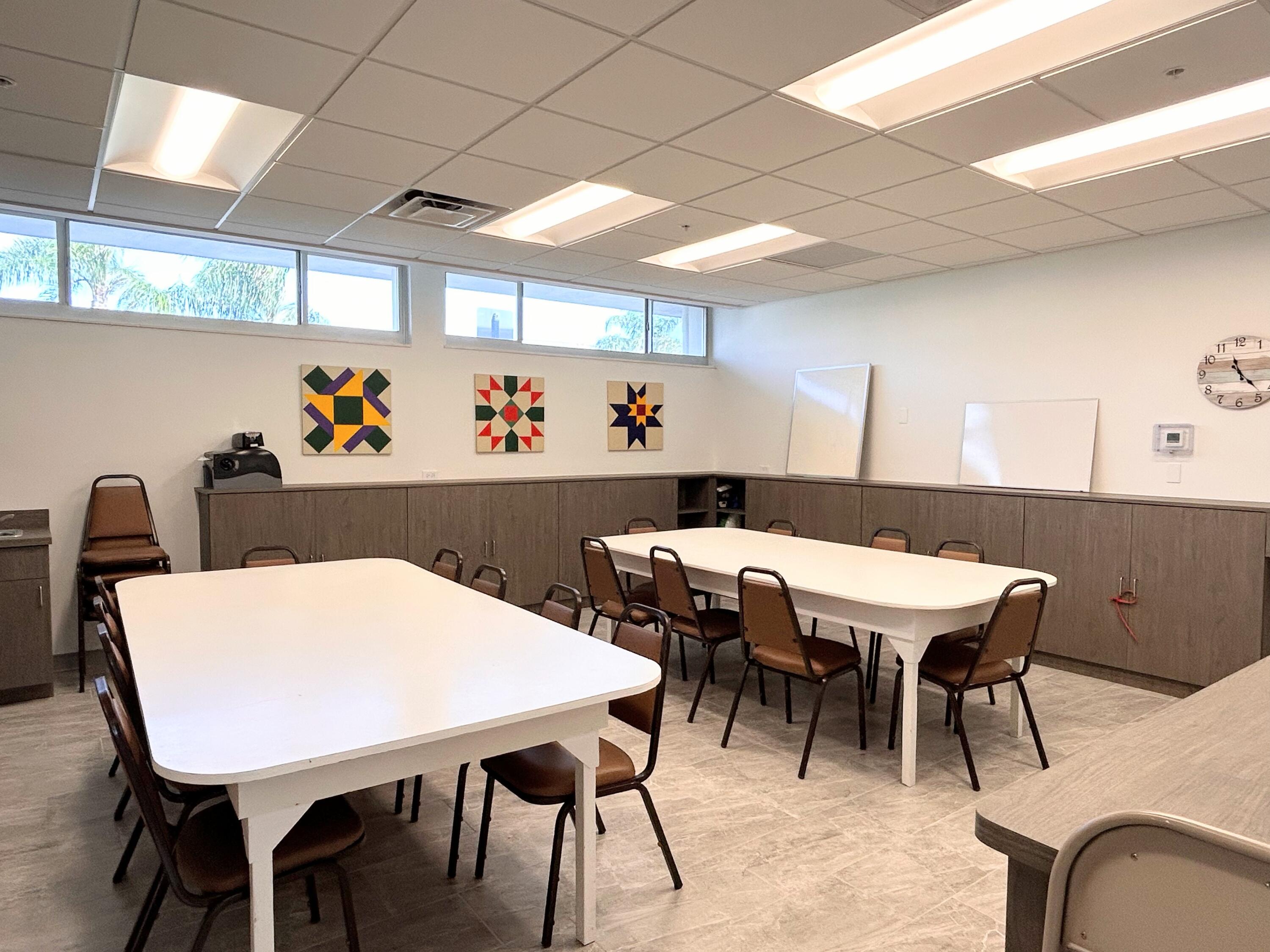 680 Horizon West, Unit 103 Boynton Beach, FL 33435 - Photo 54 of 61 a view of a table and chairs in a room