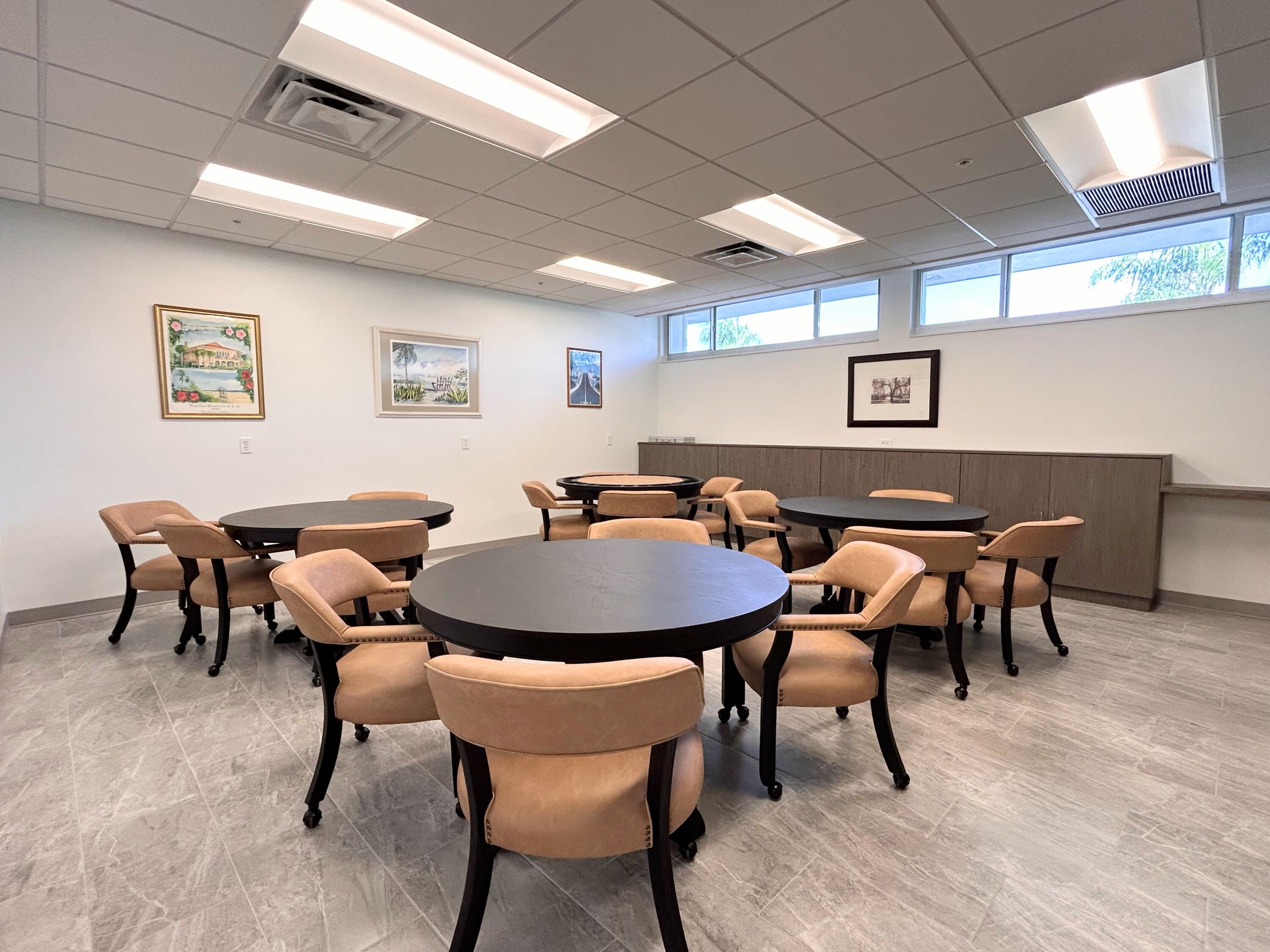 680 Horizon West, Unit 103 Boynton Beach, FL 33435 - Photo 55 of 61 a view of a dining room with furniture
