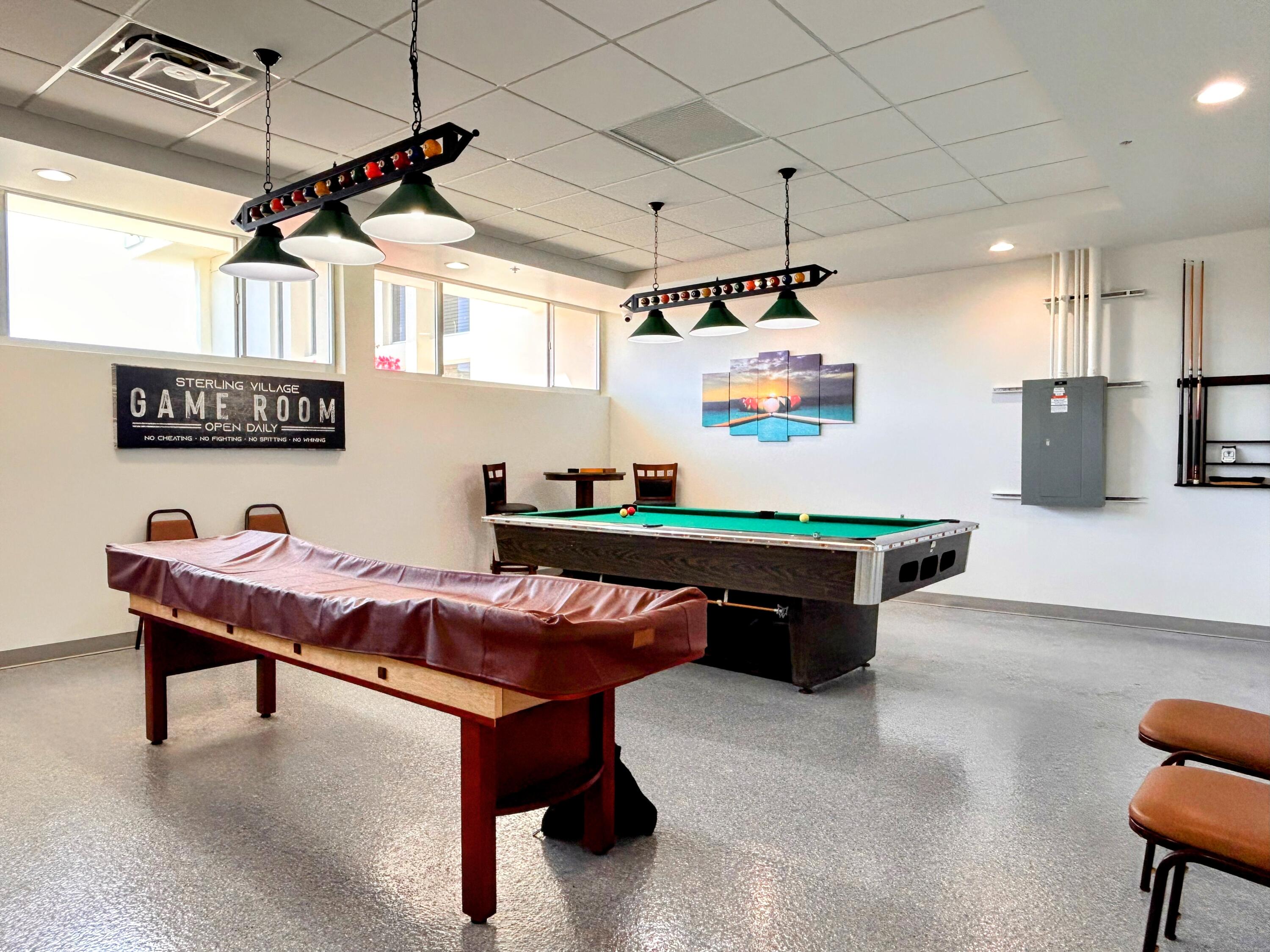 680 Horizon West, Unit 103 Boynton Beach, FL 33435 - Photo 61 of 61 a room with furniture and a table