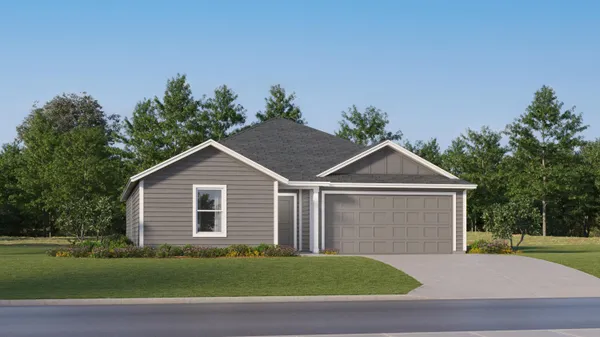 a view of a yard in front of a house with plants and large tree