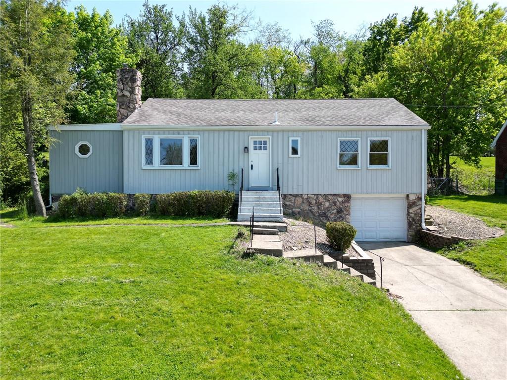 531 West Ingomar Road Pittsburgh, PA 15237 - Photo 1 of 35 a view of a house with backyard and sitting area