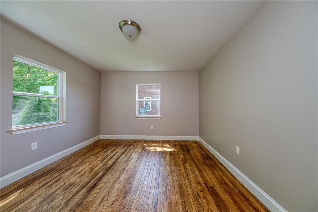 531 West Ingomar Road Pittsburgh, PA 15237 - Photo 21 of 35 a view of a room with wooden floor and window