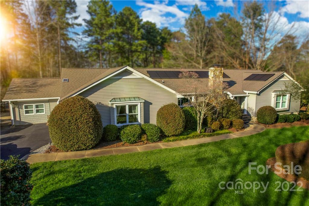 8241 Fairfield Forest Road Denver, NC 28037 - Photo 1 of 48 a view of a house with backyard