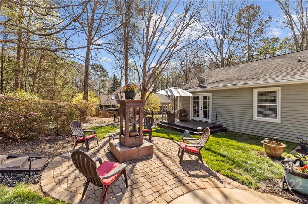 8241 Fairfield Forest Road Denver, NC 28037 - Photo 38 of 48 a view of a house with backyard and sitting area