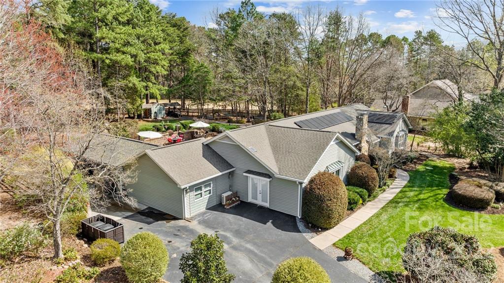 8241 Fairfield Forest Road Denver, NC 28037 - Photo 42 of 48 an aerial view of a house with yard swimming pool and outdoor seating