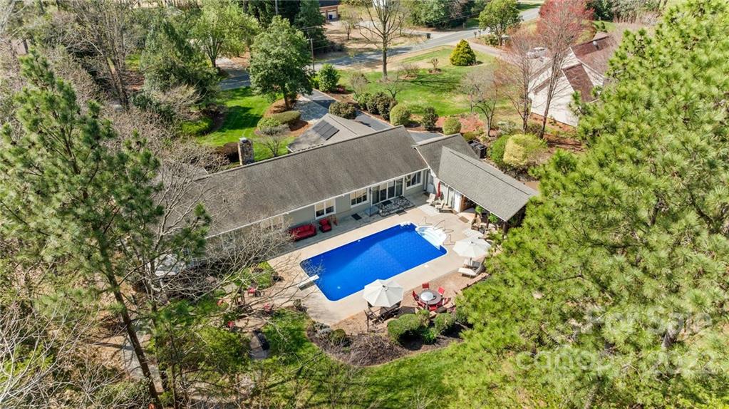 8241 Fairfield Forest Road Denver, NC 28037 - Photo 43 of 48 an aerial view of a house with a yard and swimming pool